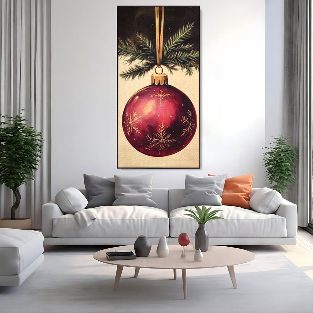 Tablou canvas cu tablou canvas cu glob de craciun visiniu, in rama de aluminiu negru, pe perete intr-un living